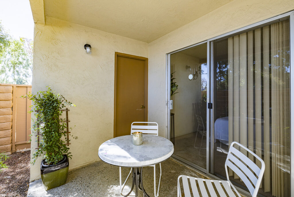 Outdoor patio and sliding door at Sundale Apartments