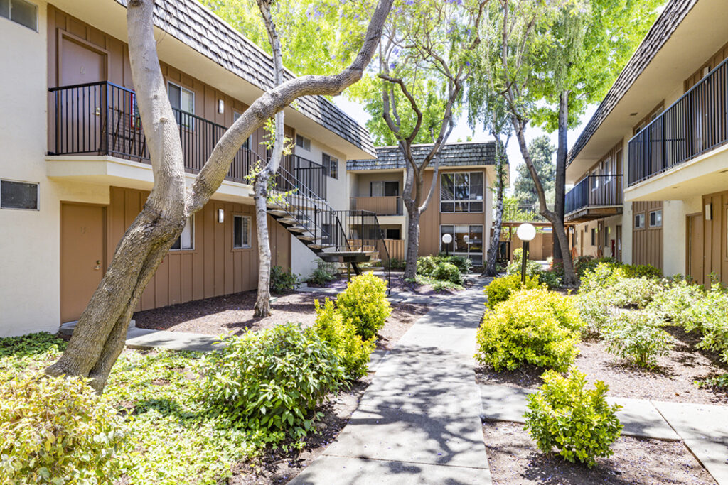 Walk way and exterior of Sundale Apartments